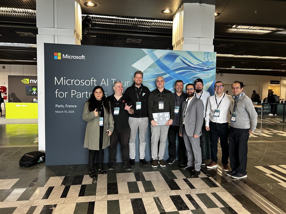 At the Microsoft AI Tour for Partners backdrop in Paris